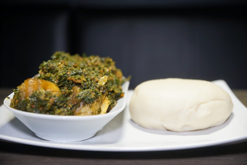 Nigerian vegetable soup served with pounded yam